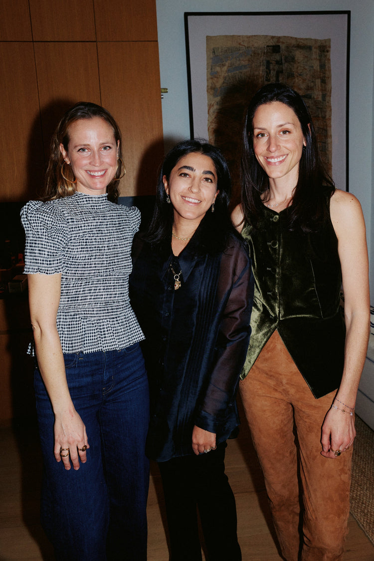 three woman smiling at camera