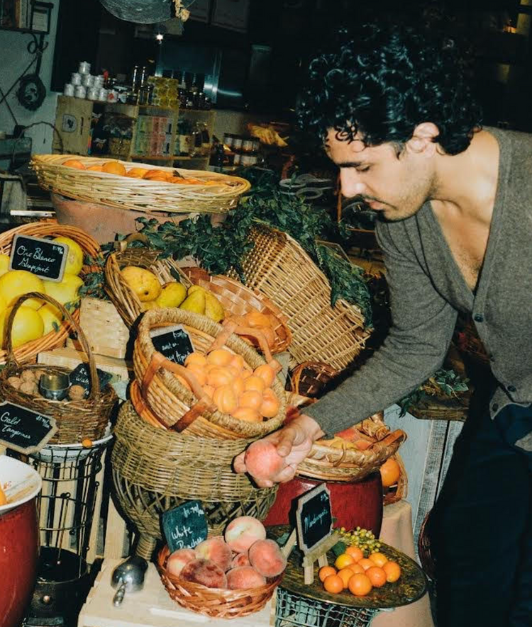man buying fruit