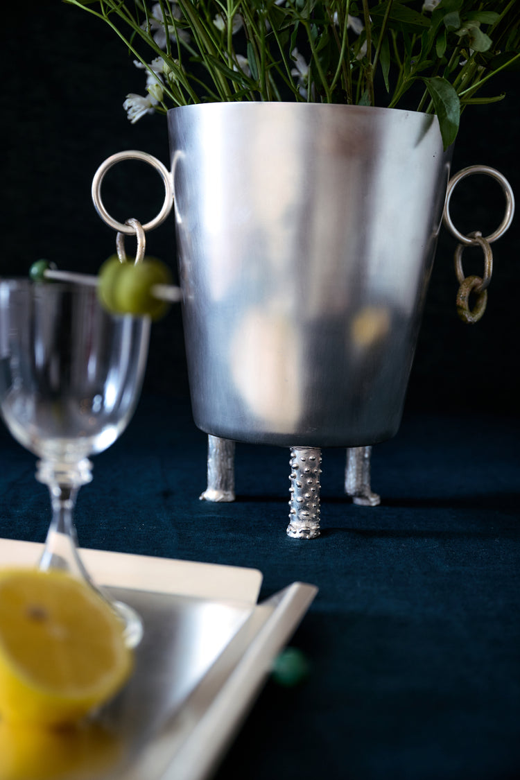 silver ice bucket with flowers