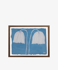 White Flowers is a framed artwork by Nancy McKie, portraying two white drooping flowers with slender stems on a blue background, signed NM at the bottom right. Part of her Field Studies series, it was featured at the Art360 exhibition.