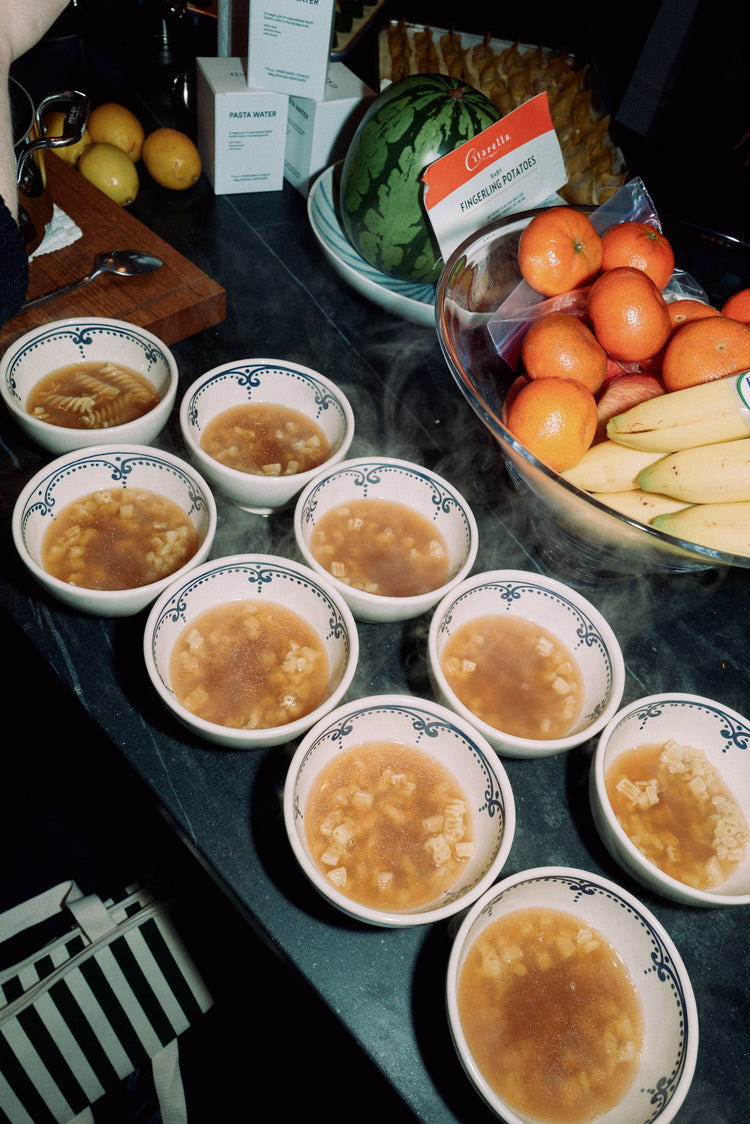 bowls of soup on a counter