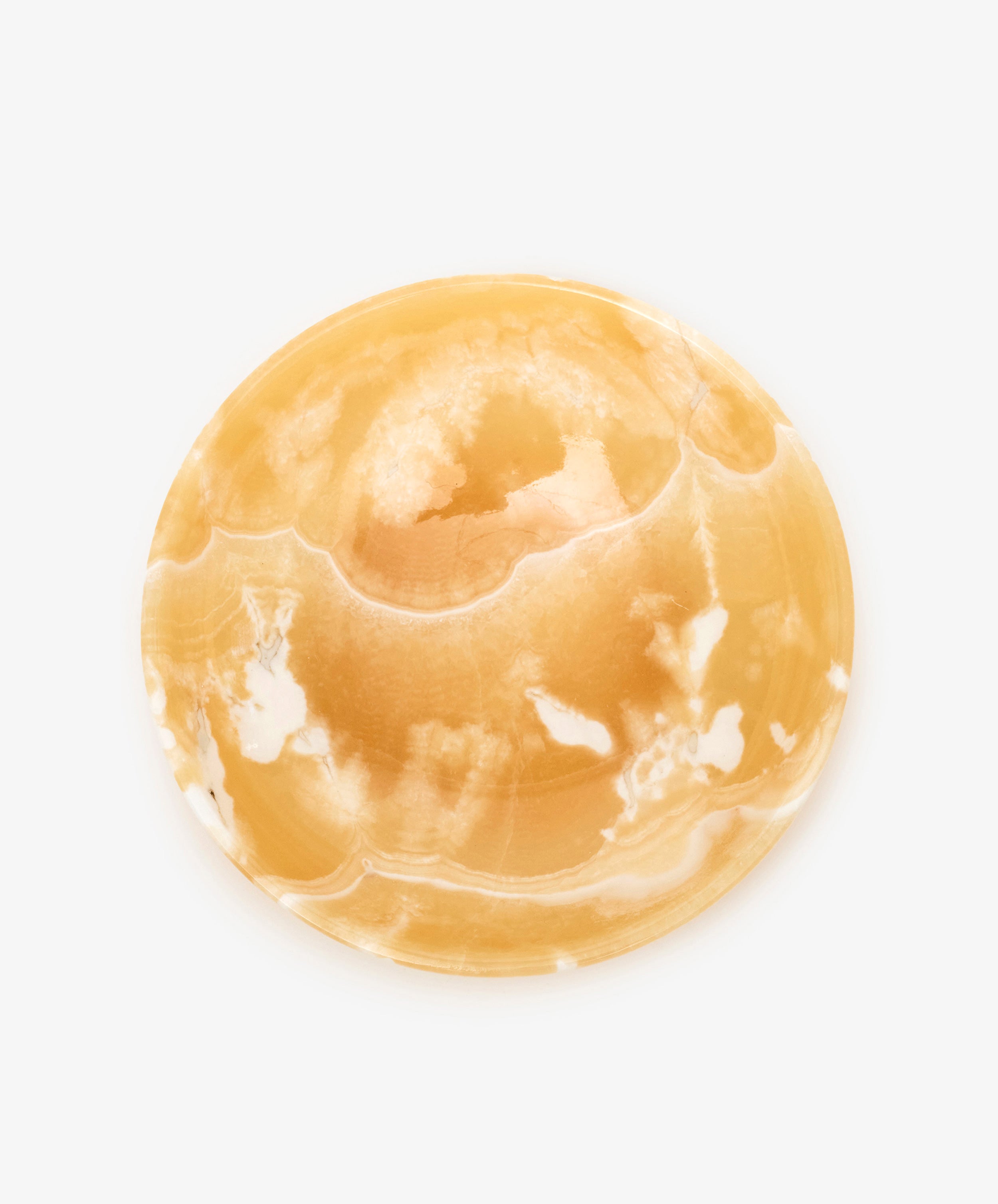 The Akila Decorative Bowl, crafted from round, polished yellow and white agate, stands out on a plain white background—perfect as a unique, handcrafted home decor piece.