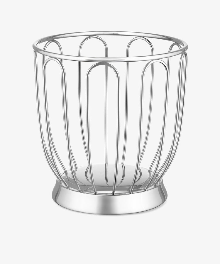 The Spicchio Citrus Basket, a silver metal wire accessory with a round base and vertical bars, is shown against a plain white background.