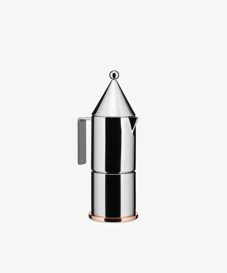 The La Conica Espresso Coffee Maker is positioned upright against a plain white background, showcasing its stainless steel design with a conical lid and side handle.