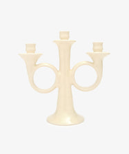 Loretta Candelabra. Ivory white glazed ceramic candle holder with sculptural shape and space for three candles.