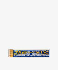 A partially open box of Luxury Matches in blue and yellow reveals matchsticks inside, set against a white background—ideal for adding a touch of seafaring decor to any space.