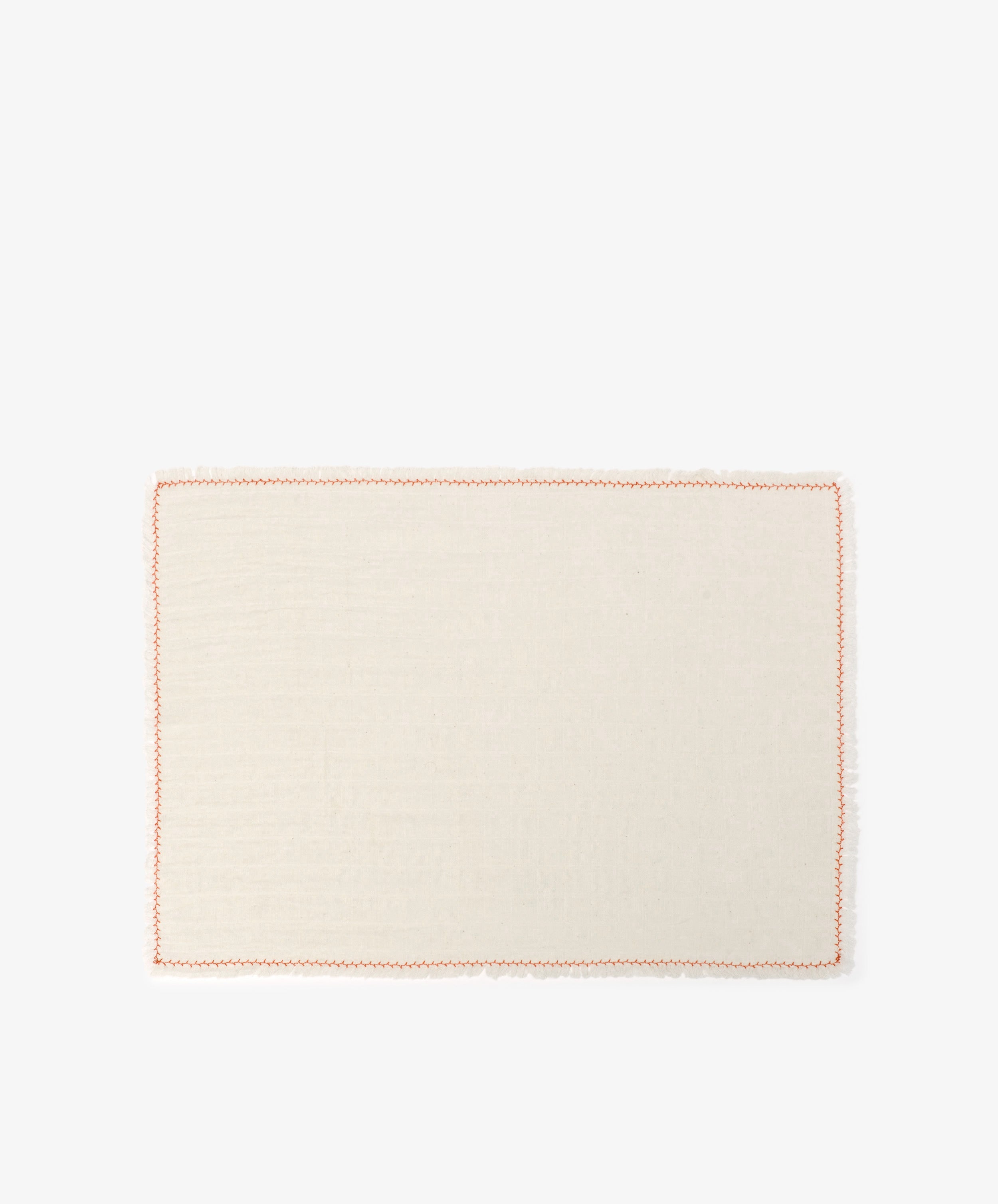 The Filial Placemat, Set of 6, features rectangular cream-colored cloth placemats with a simple orange branch stitch border, ideal for elegant tabletop decor. Shown on a plain white background.