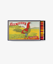 The Giant Cock by Archivist Gallery. Colorful illustrated matchbox with rooster and red, yellow and orange matches.