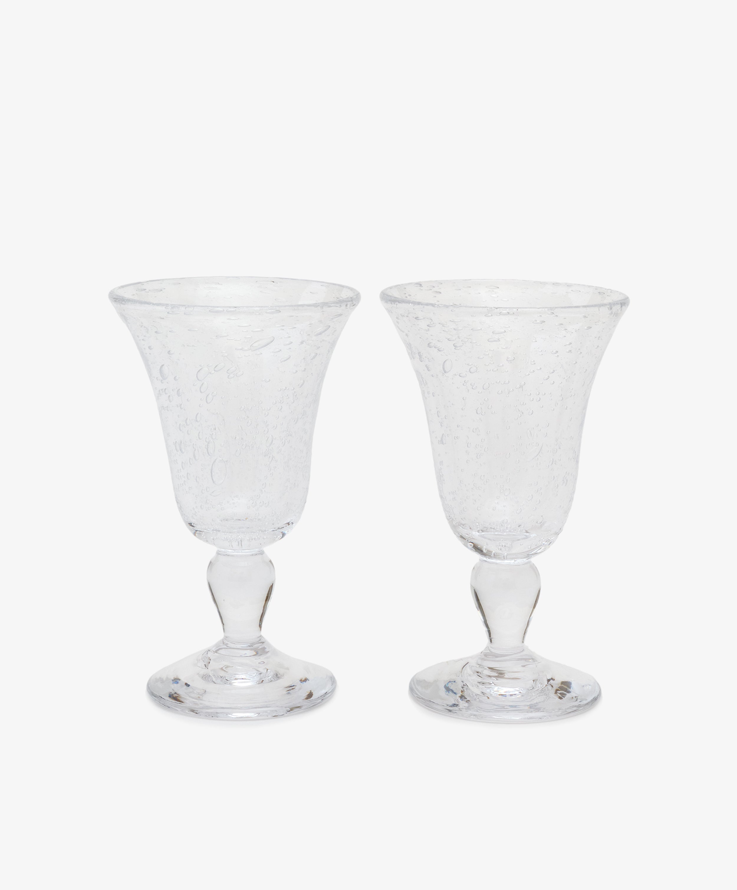 Lauren Wine Glass. Pair of clear bubble glass stemware glasses.