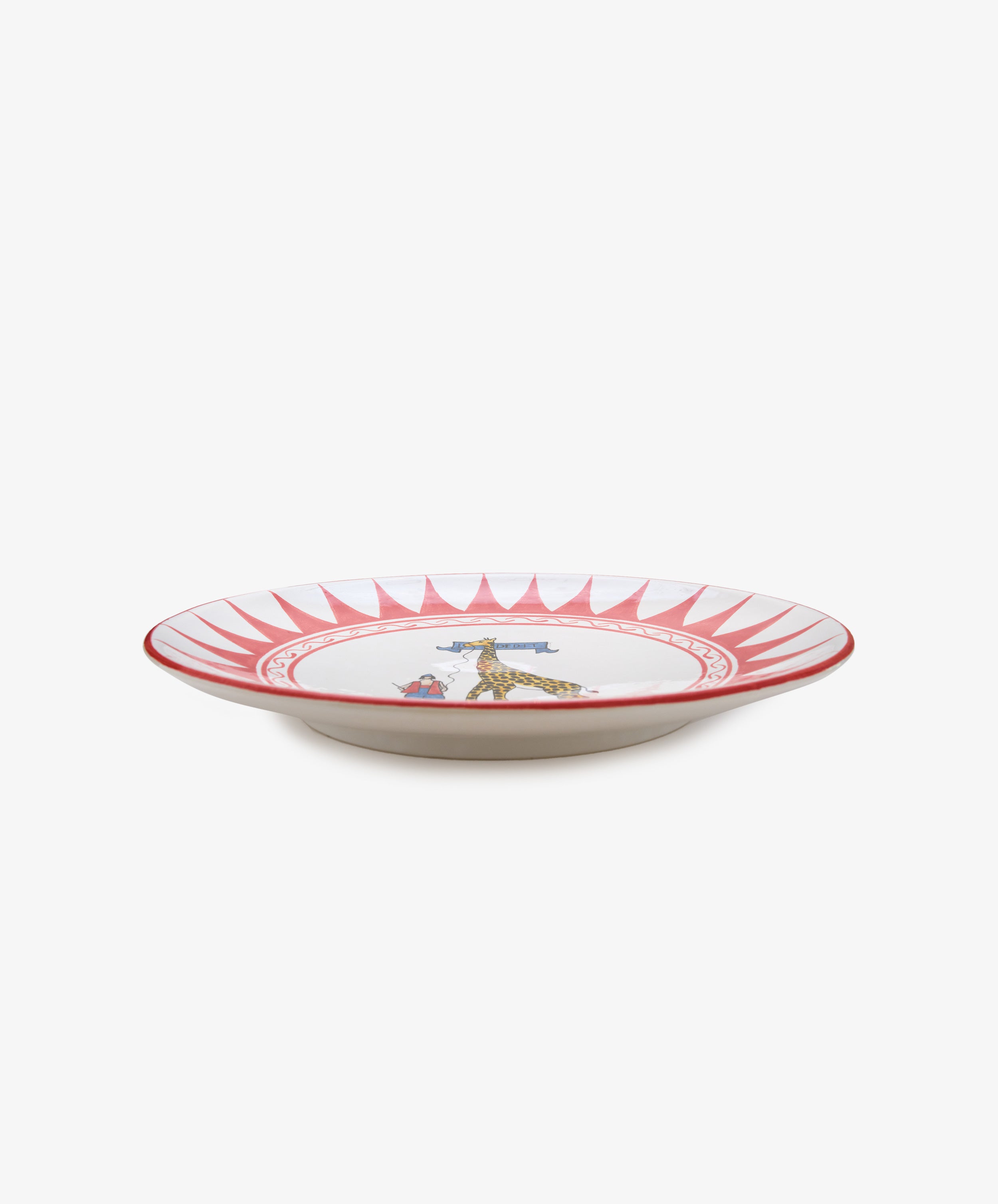 Palio Round Serving Platter. Large white glazed ceramic plate with red accents, side view.