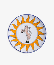 Palio Round Serving Platter. Large white glazed ceramic plate with orange and blue accents and unicorn motif.