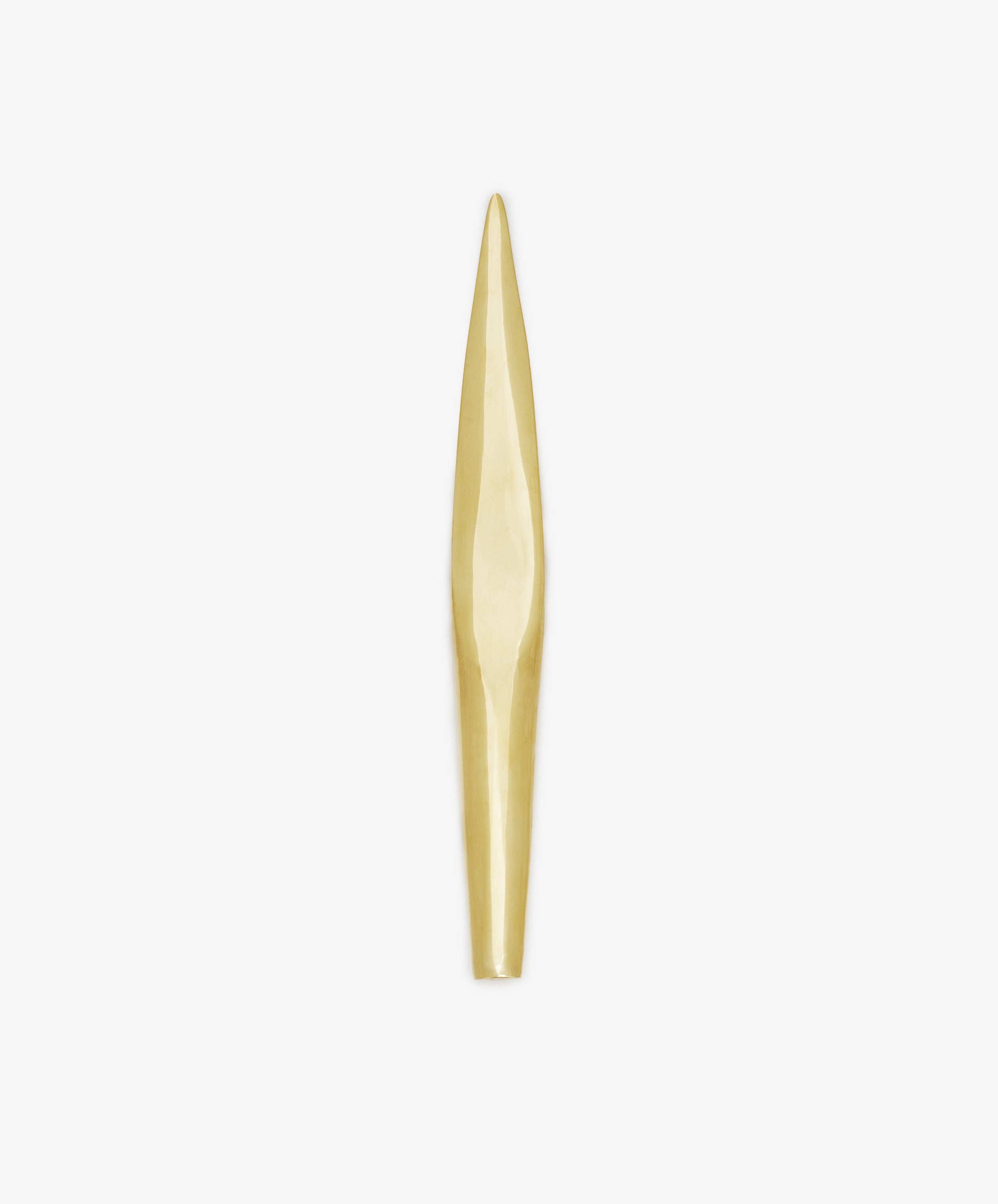Displayed on a plain white background, the Letter Opener is a long, narrow desk accessory made of gold-colored solid brass featuring a tapered, pointed end and a smooth surface.