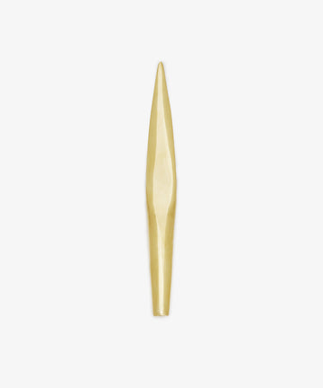 Displayed on a plain white background, the Letter Opener is a long, narrow desk accessory made of gold-colored solid brass featuring a tapered, pointed end and a smooth surface.