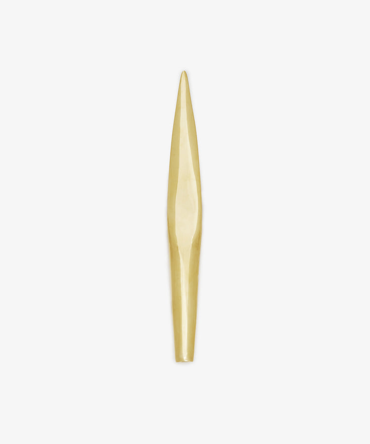 Displayed on a plain white background, the Letter Opener is a long, narrow desk accessory made of gold-colored solid brass featuring a tapered, pointed end and a smooth surface.
