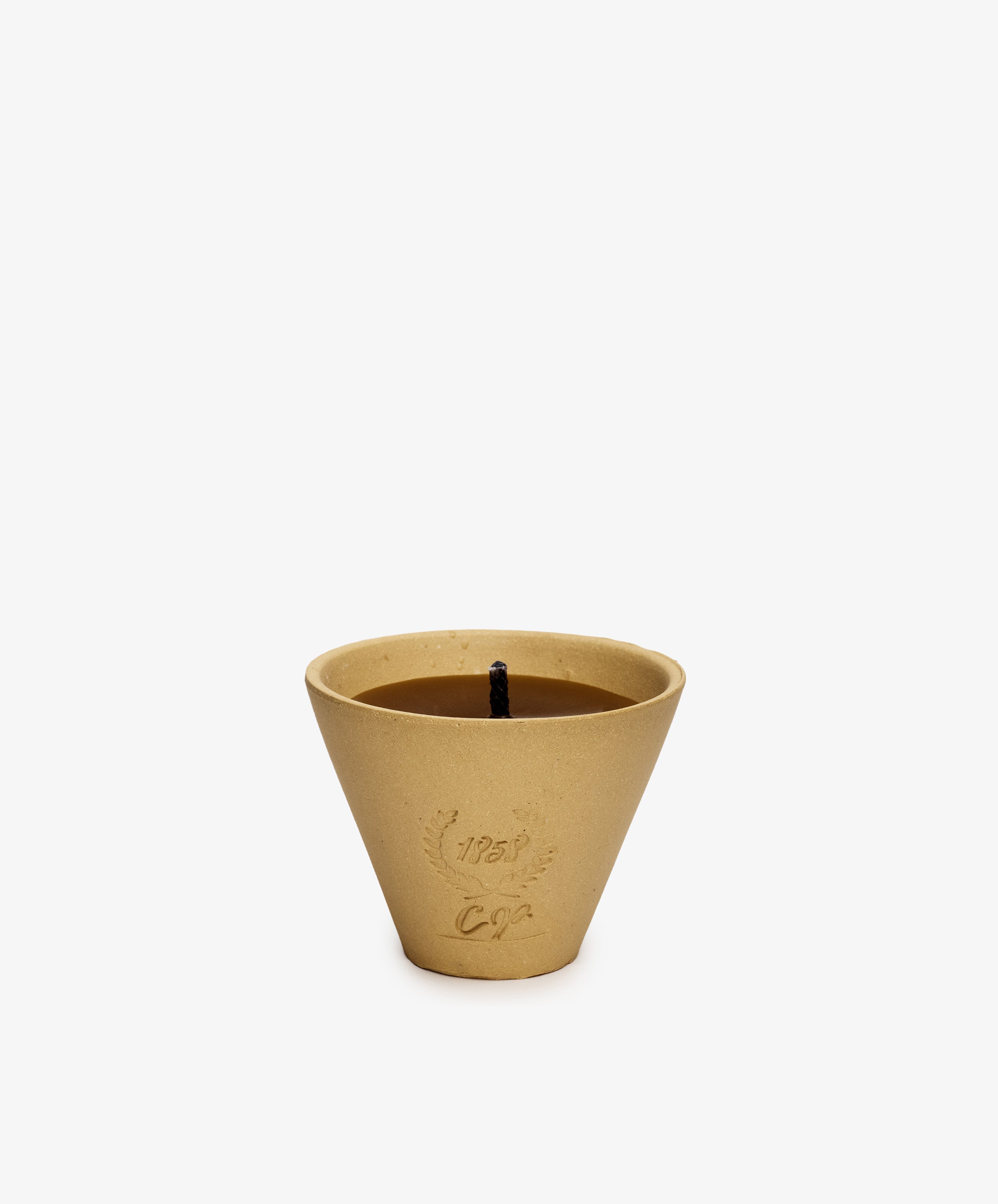 Enjoy summer evenings with the Francine Citronella Outdoor Candle—a tan, cone-shaped candle in a textured container with decorative embossing and a single black wick.