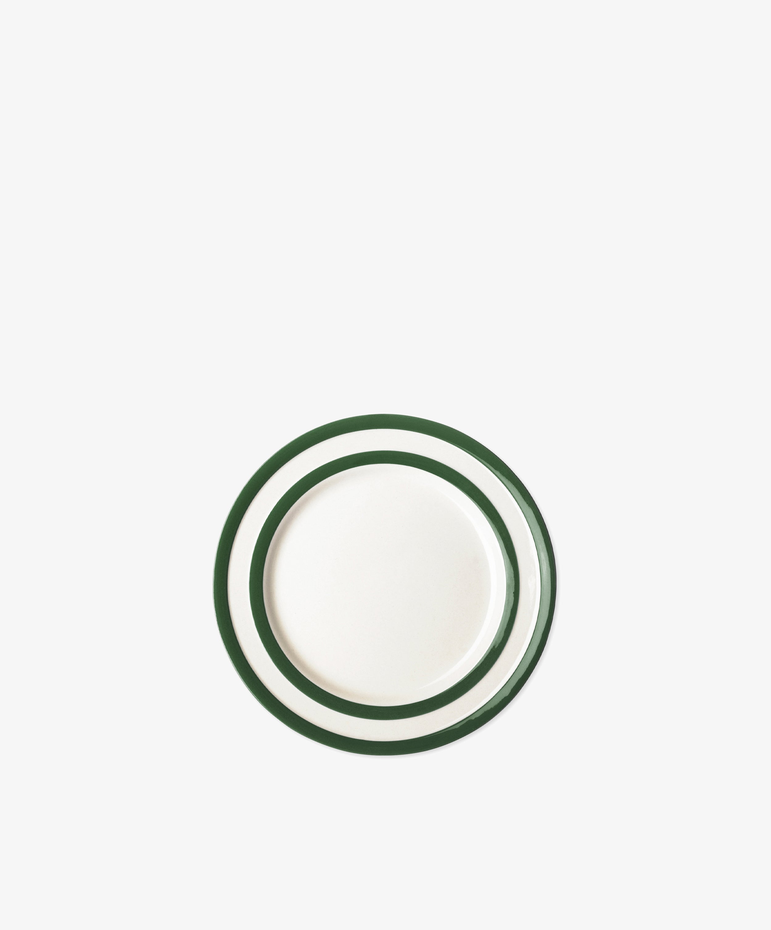 The Betty Breakfast Plate features a round white design with two green concentric rings near the rim, inspired by classic UK West Country pottery and displayed on a plain white background.