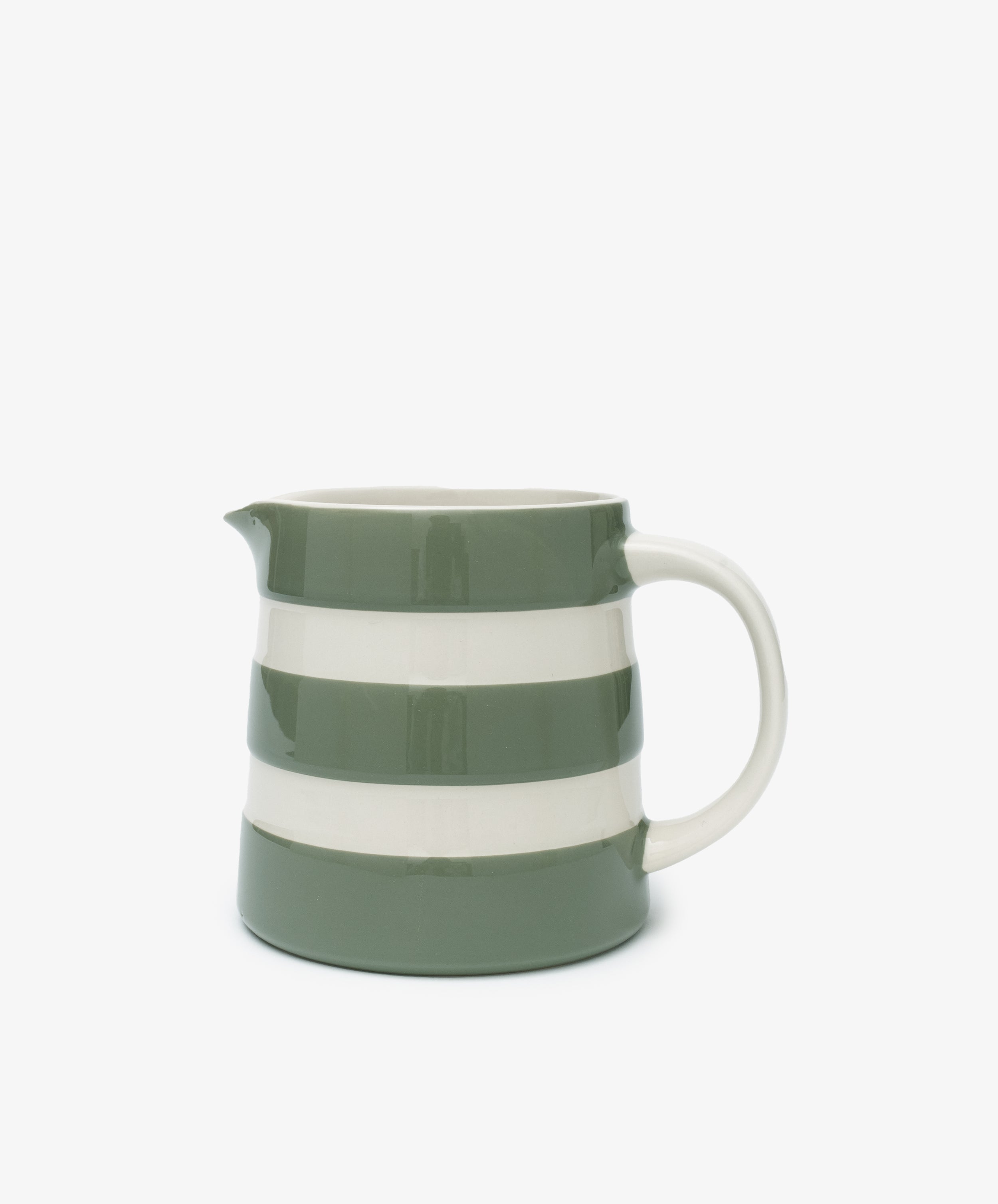 The Betty Large Dreadnought Jug, a ceramic piece with green and white horizontal stripes, handle, and spout, is displayed on a plain white background—showcasing classic UK West Country pottery.