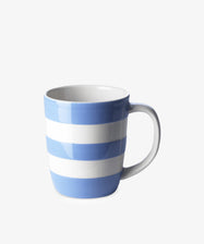 The Betty Mug is a ceramic cup inspired by UK West Country pottery, showcasing blue and white horizontal stripes and set against a plain white background.