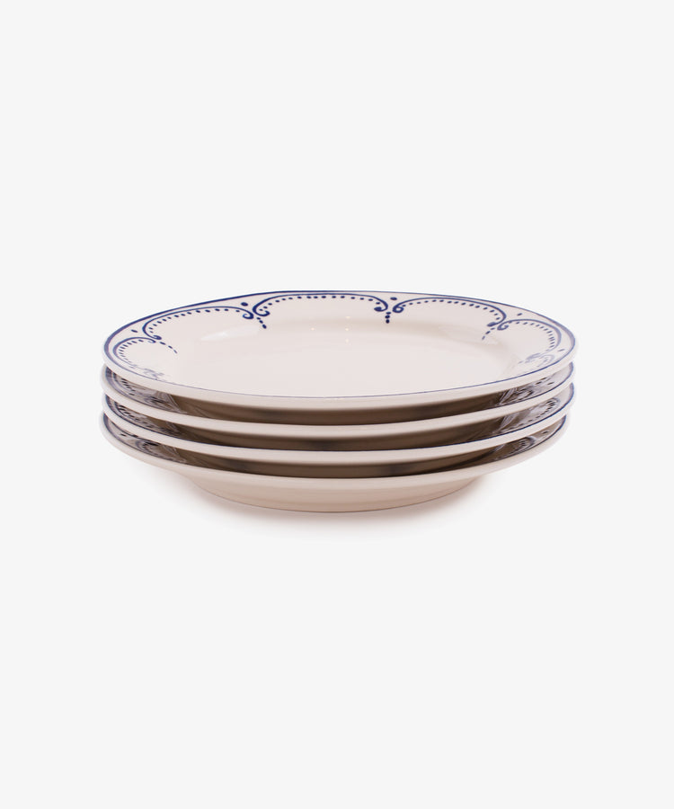 Stack of four Arco small plates.