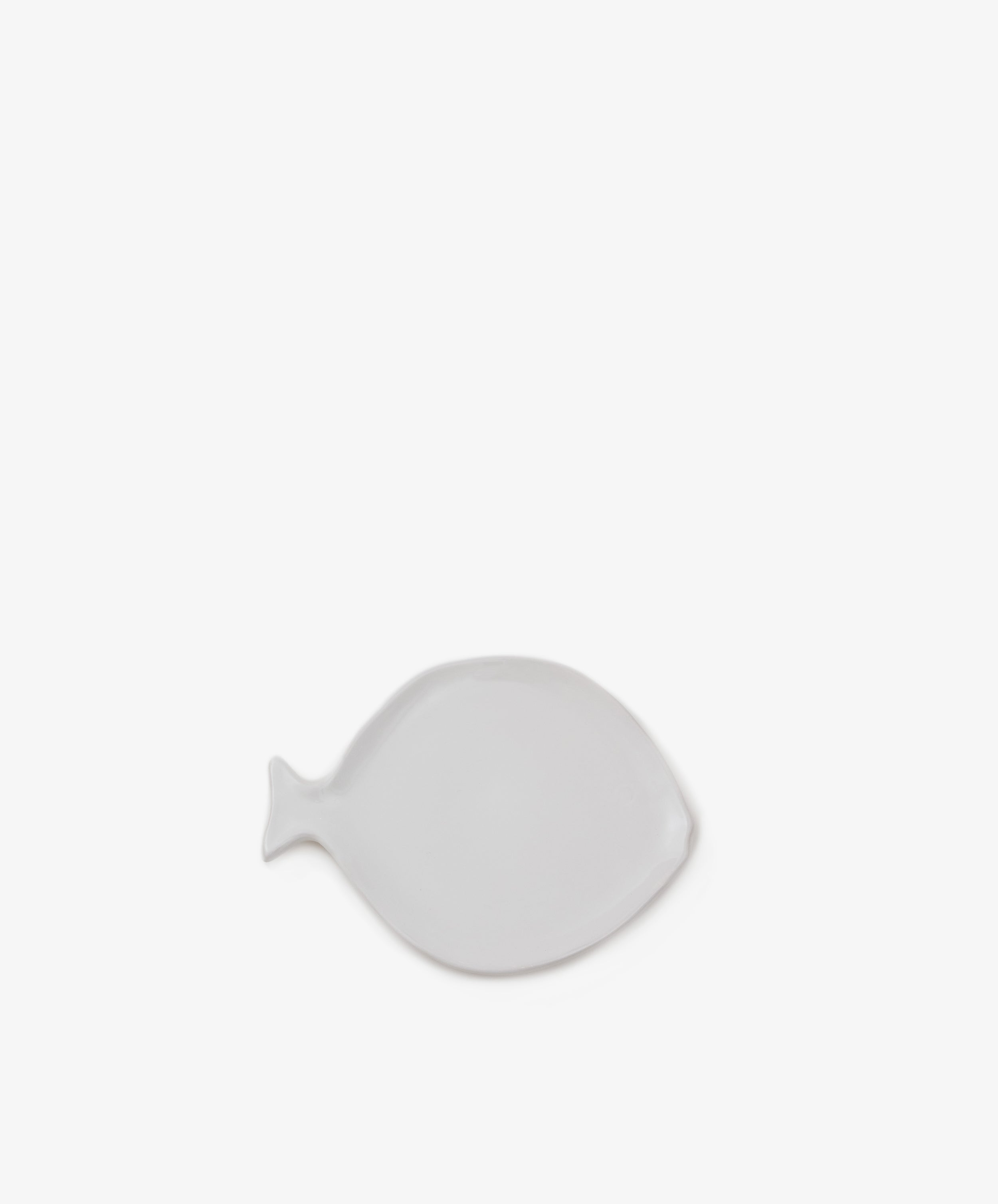 Lorenzo Fish Plate by Enza Fasano. White glazed ceramic plate shaped like a fish.