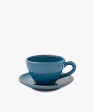 The Guido Coffee Set features a blue ceramic breakfast cup on a matching saucer, perfect for enjoying your morning coffee against a plain white background.