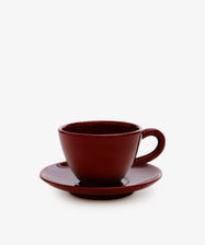 The Guido Coffee Set features a dark red ceramic breakfast cup with a matching saucer, displayed against a plain white background.