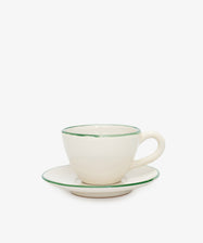 The Guido Coffee Set features a cream-colored ceramic breakfast cup with handle and matching saucer, both accented by a thin green rim, displayed against a plain white background.