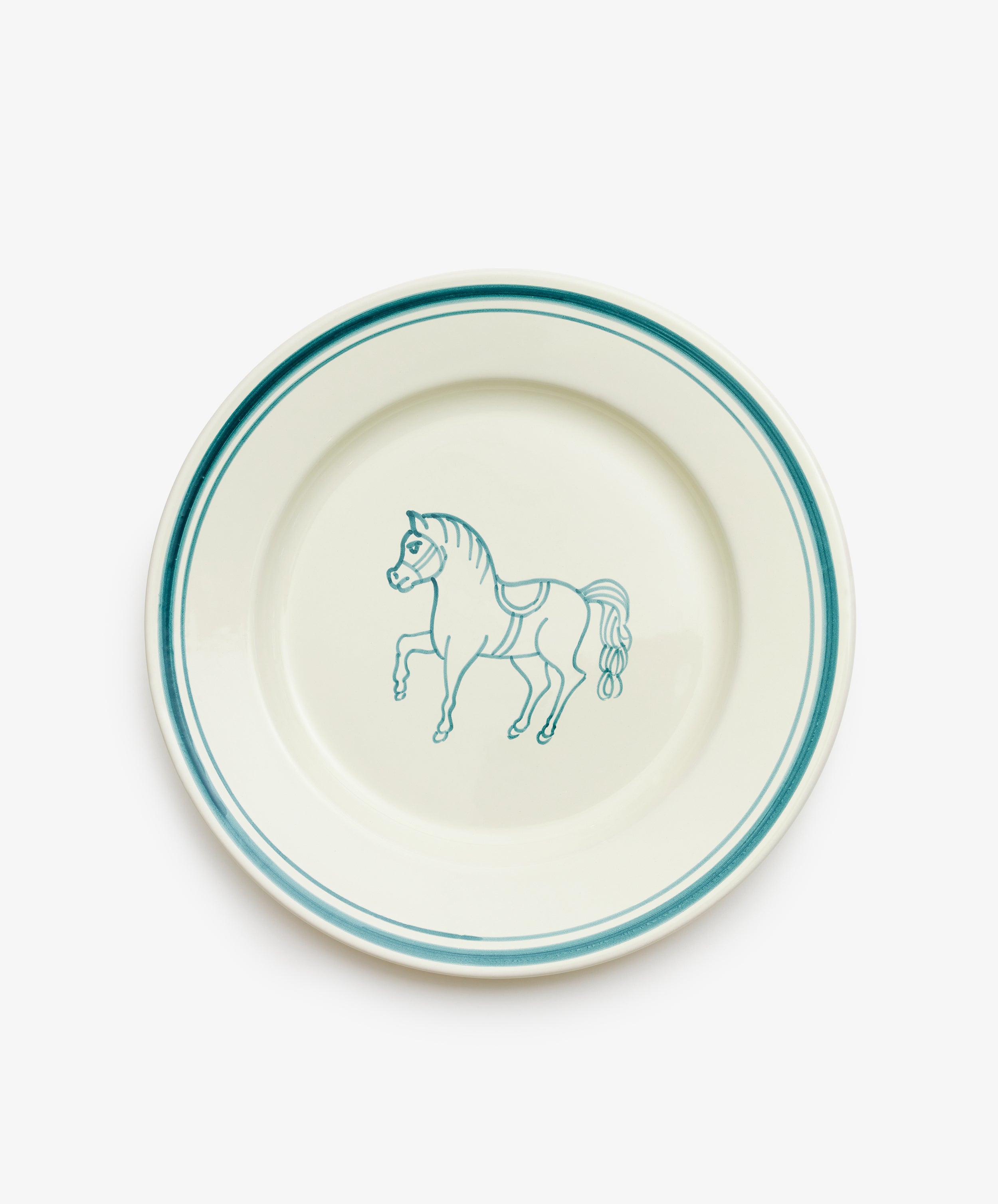 The Folk Dinner Plate, Horse is a white ceramic plate with teal rim accents and a hand-painted teal horse illustration at the center, expertly crafted by an Italian ceramist.