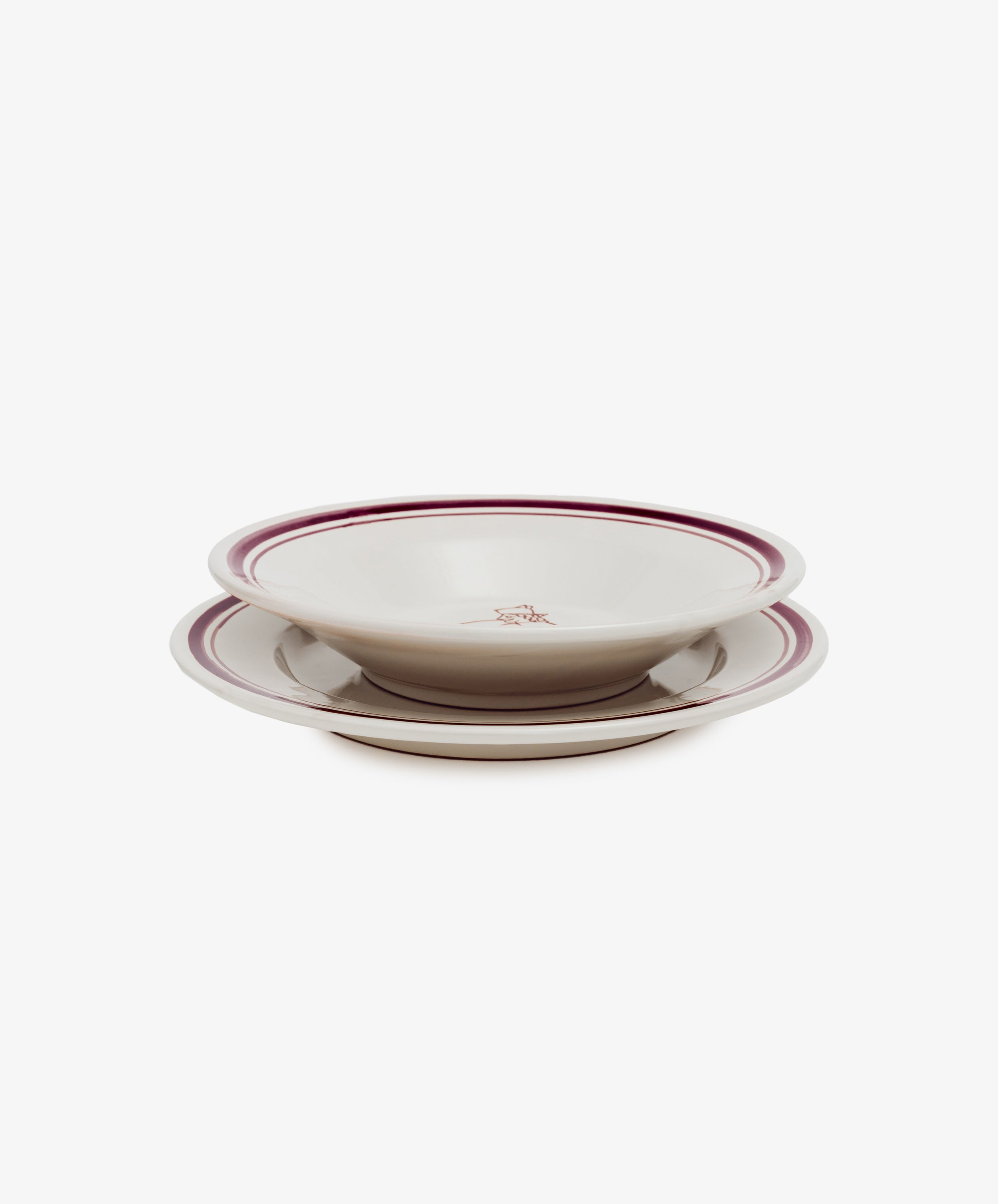 Two hand-glazed Folk Pasta Bowls, Farmer edition, featuring a maroon-striped rim and small central emblem, stacked on a white background—elegant ceramic tableware designed for refined dining.