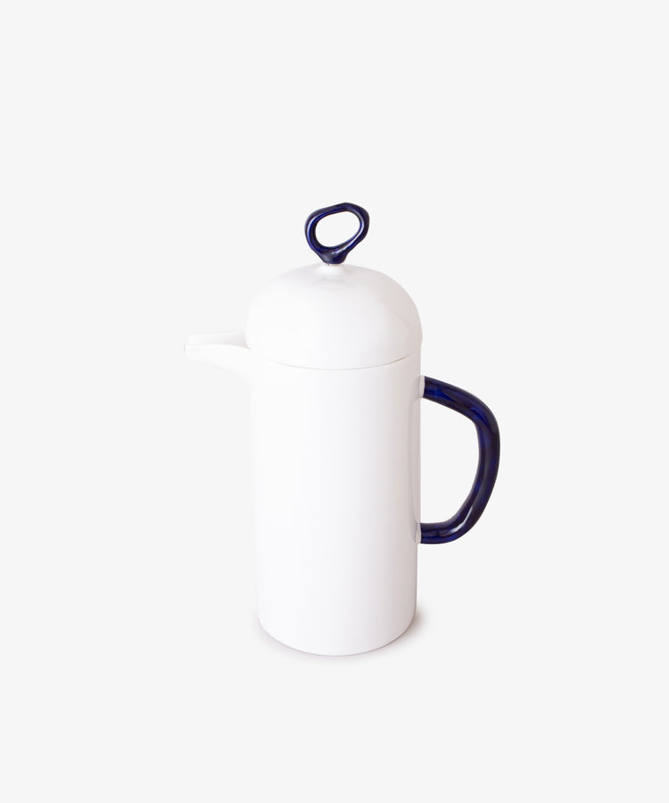 A Cafetière with a rounded lid and a dark blue handle sits on a plain white background.