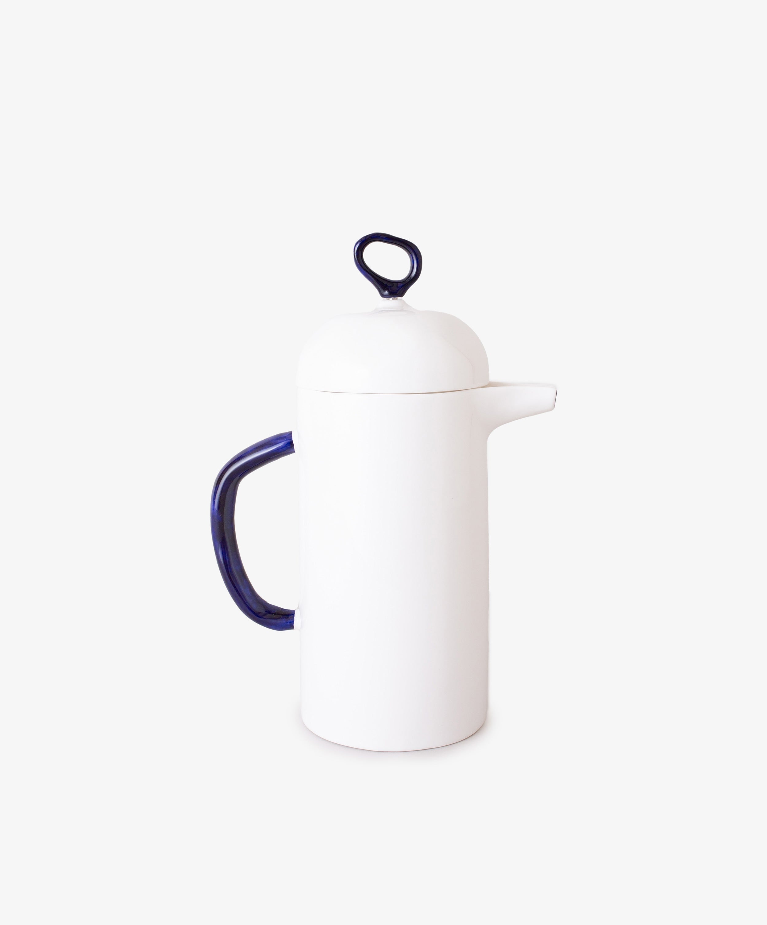The Cafetière is a white ceramic coffee maker featuring a dark blue handle and matching loop on the lid, shown on a plain white background—ideal for enhancing your daily coffee experience.