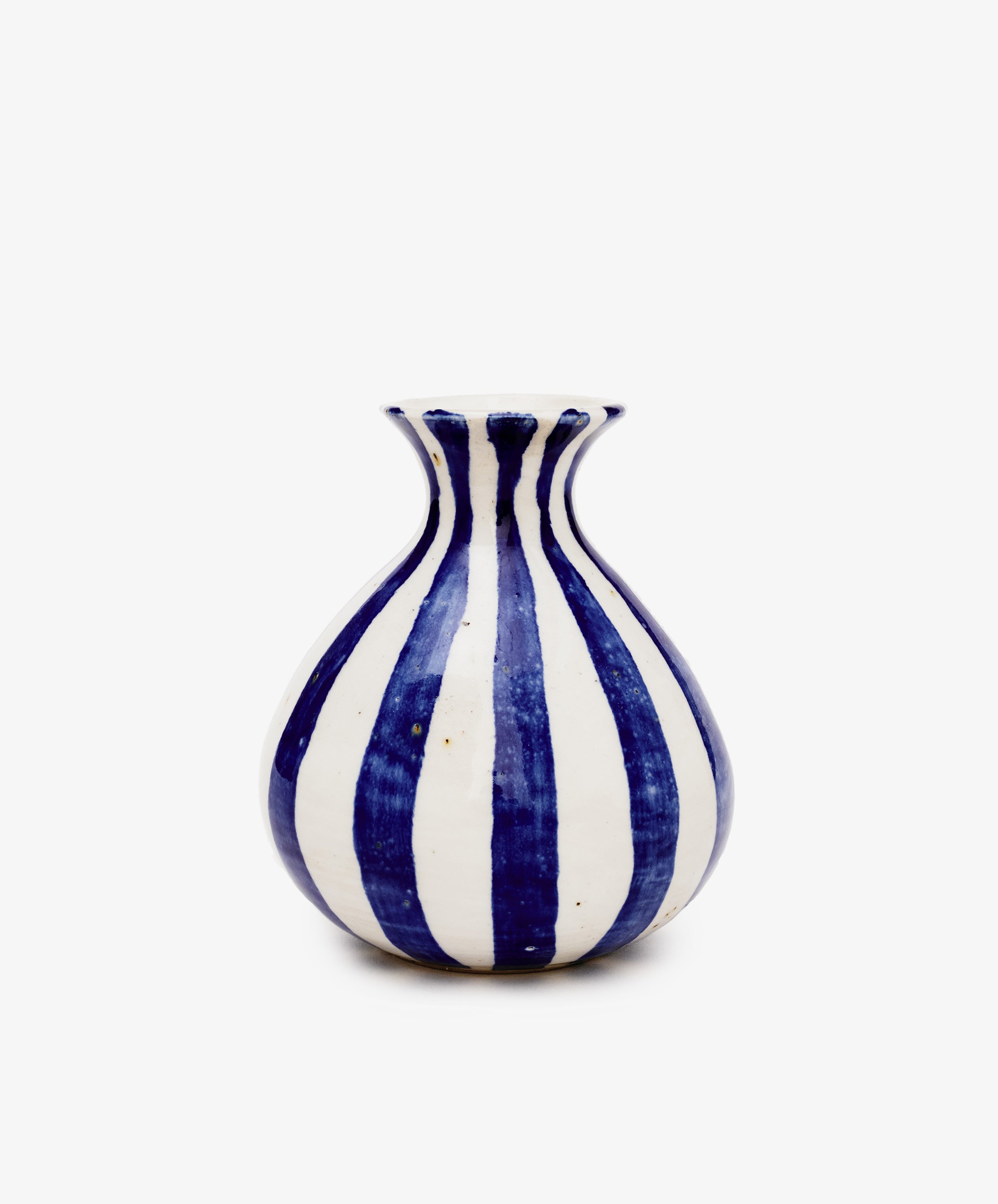 The Flora Bud Vase by George Bronwin is a hand-thrown ceramic piece with a round body, flared neck, and bold vertical cobalt stripes on a plain white background.