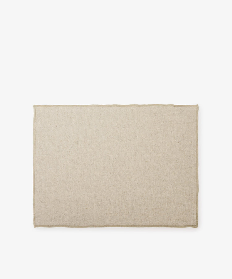 The Corte Placemat, Set of 6, features rectangular beige linen placemats laid flat on a plain white background—ideal for an eco-friendly table setting.