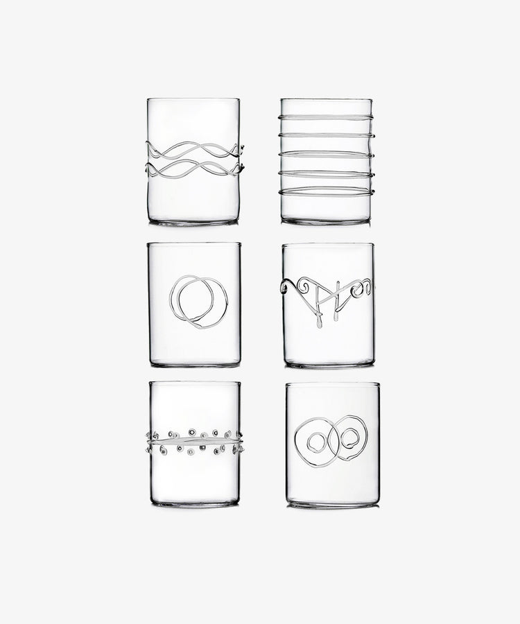 The Deco Water Glass, Set of 6, features six clear glasses with unique raised patterns encircling each piece—stylish accents arranged in two rows of three to add a joyful touch to any table setting.