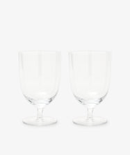 The Venezia Wine Glass, Set of 6 features elegant short-stemmed wine glasses displayed side by side on a plain white background, highlighting their clear and refined design.