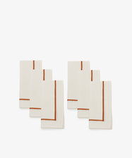 Riga Napkin. Two sets of three natural linen napkins with rust stitched stripe detail.