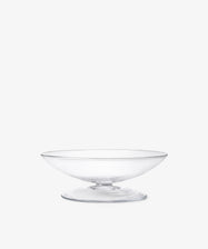 The Bubble Glass Grape Tray features a clear, wide, shallow pedestal design that highlights exquisite glass-blowing artistry, resembling a sculptural tray, and is shown against a plain white background.
