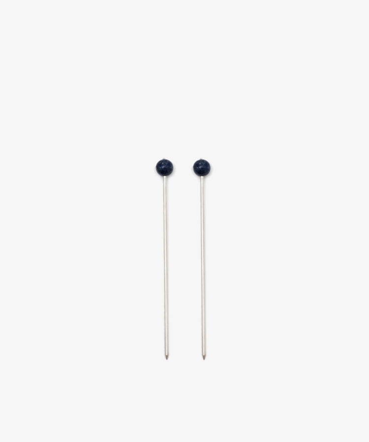 The Ella Cocktail Sticks, Set of 2, are displayed parallel to each other on a plain white background, their dark round heads evoking the look of elegant sewing pins.