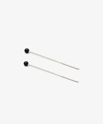 Two straight silver Ella Cocktail Sticks with black round heads, offered as a set of 2, are placed parallel to each other on a plain white background.