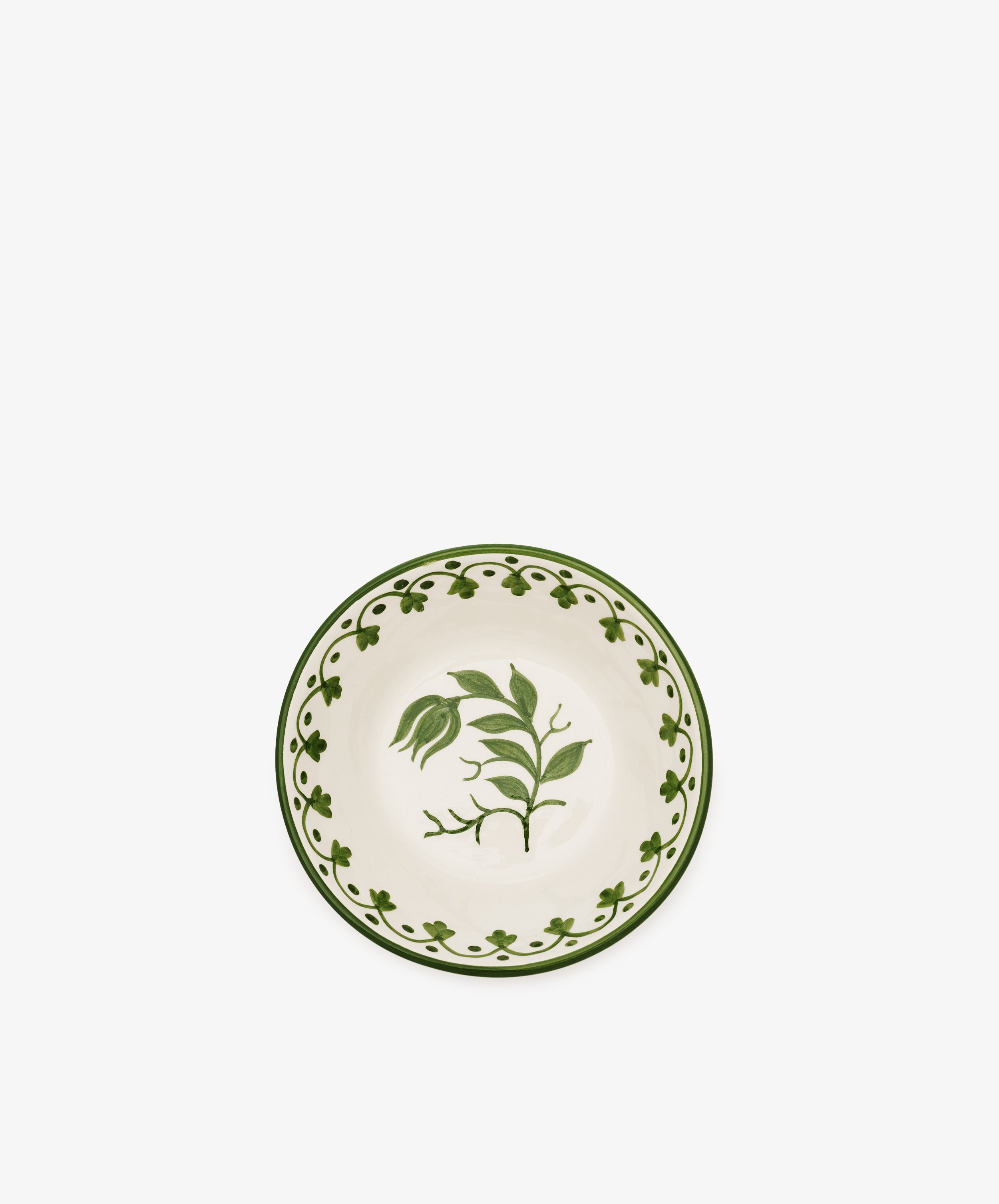 The Esmeralda Cereal Bowl, Set of 4, features a handmade design with green floral patterns and a decorative green border on a white ceramic background.