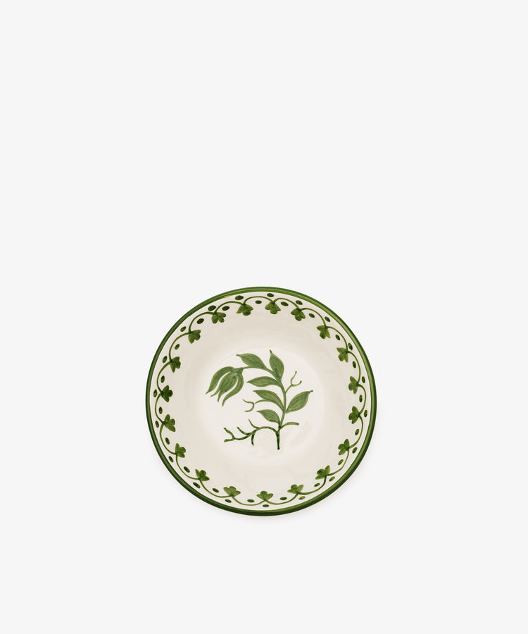 The Esmeralda Cereal Bowl, Set of 4, features a handmade design with green floral patterns and a decorative green border on a white ceramic background.