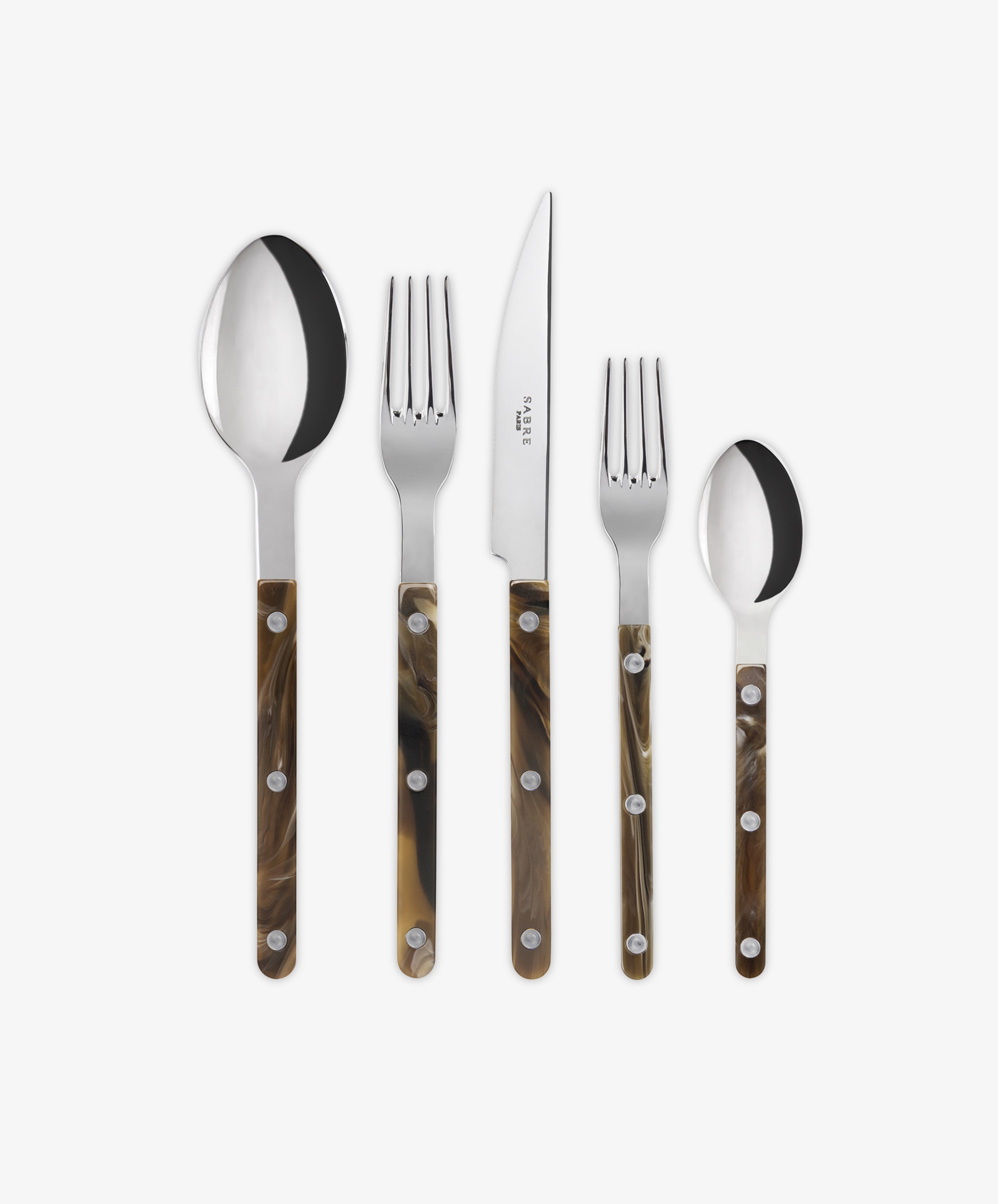The Bistrot 5 Piece Cutlery Set features silver utensils with brown, marbled buffalo handles and includes a tablespoon, dinner fork, dinner knife, salad fork, and teaspoon arranged side by side.