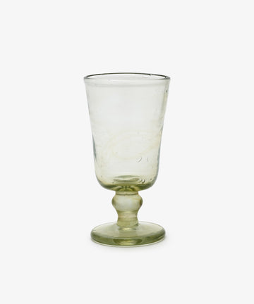 The Elodie Stemmed Wine Glass, Set of 6, features clear recycled glass with a short stem, round base, and slightly flared rim. Each glass is photographed against a plain white background.