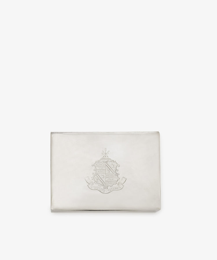 Vintage Scottish Silver Box featuring an engraved crest and decorative emblem centered on the front, displayed against a plain white background.