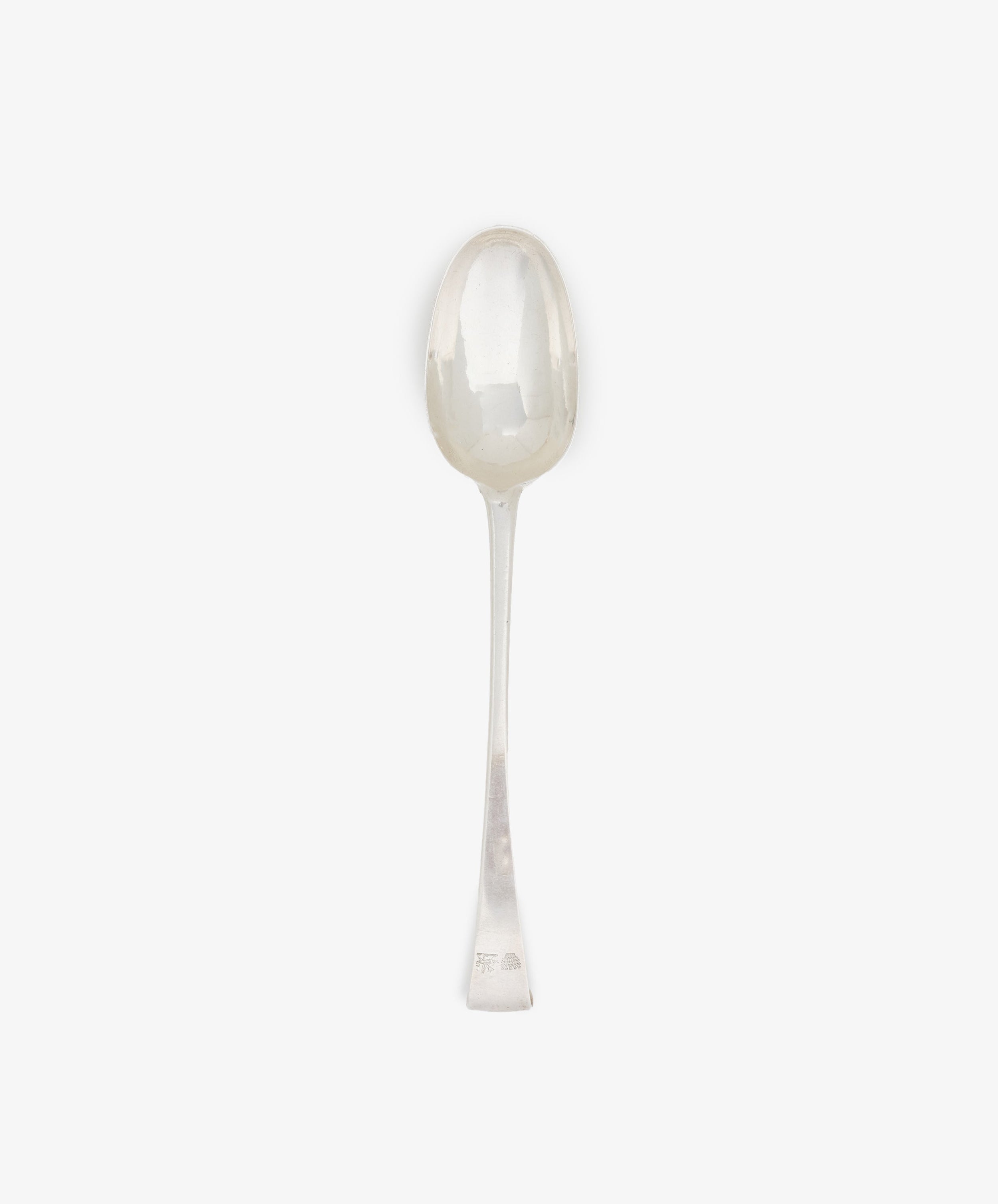 A Vintage Irish Silver Basting Spoon with a rounded bowl and straight handle is displayed on a plain white background.