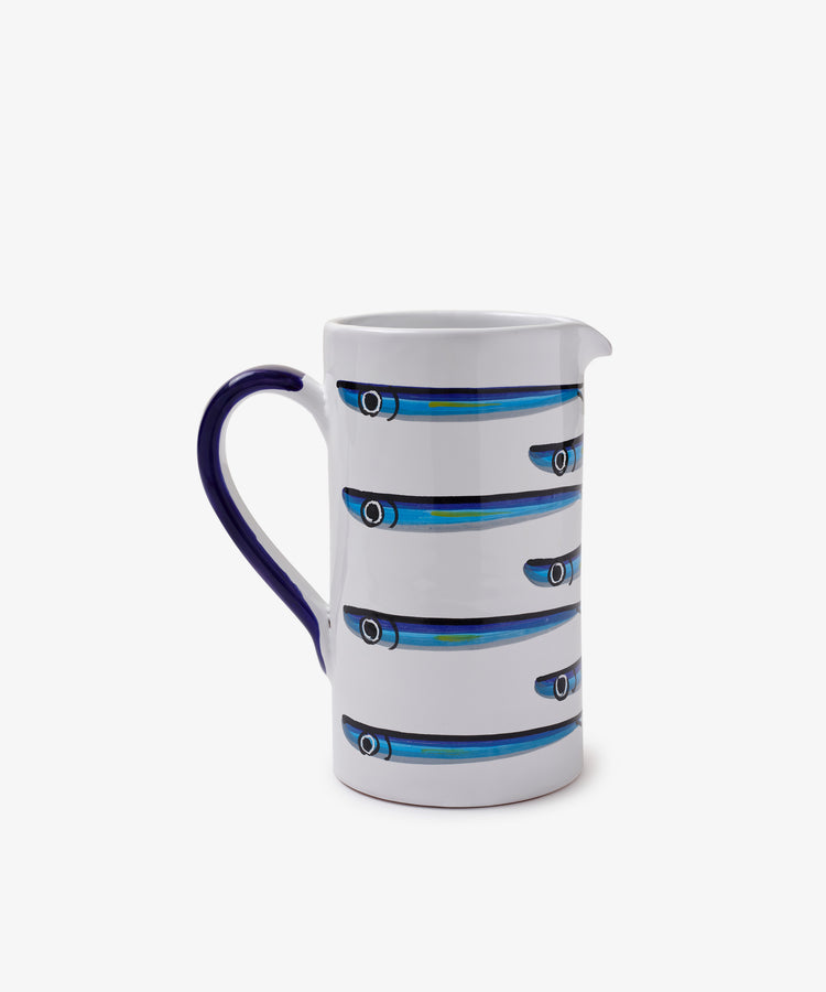 The Tommaso Jug is a white ceramic pitcher with a dark blue handle and horizontal blue sardine pattern—ideal for adding Amalfi Coast charm to your table and pairing with serving platters.