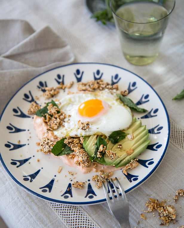 plate with cream cheese and eggs and avocado