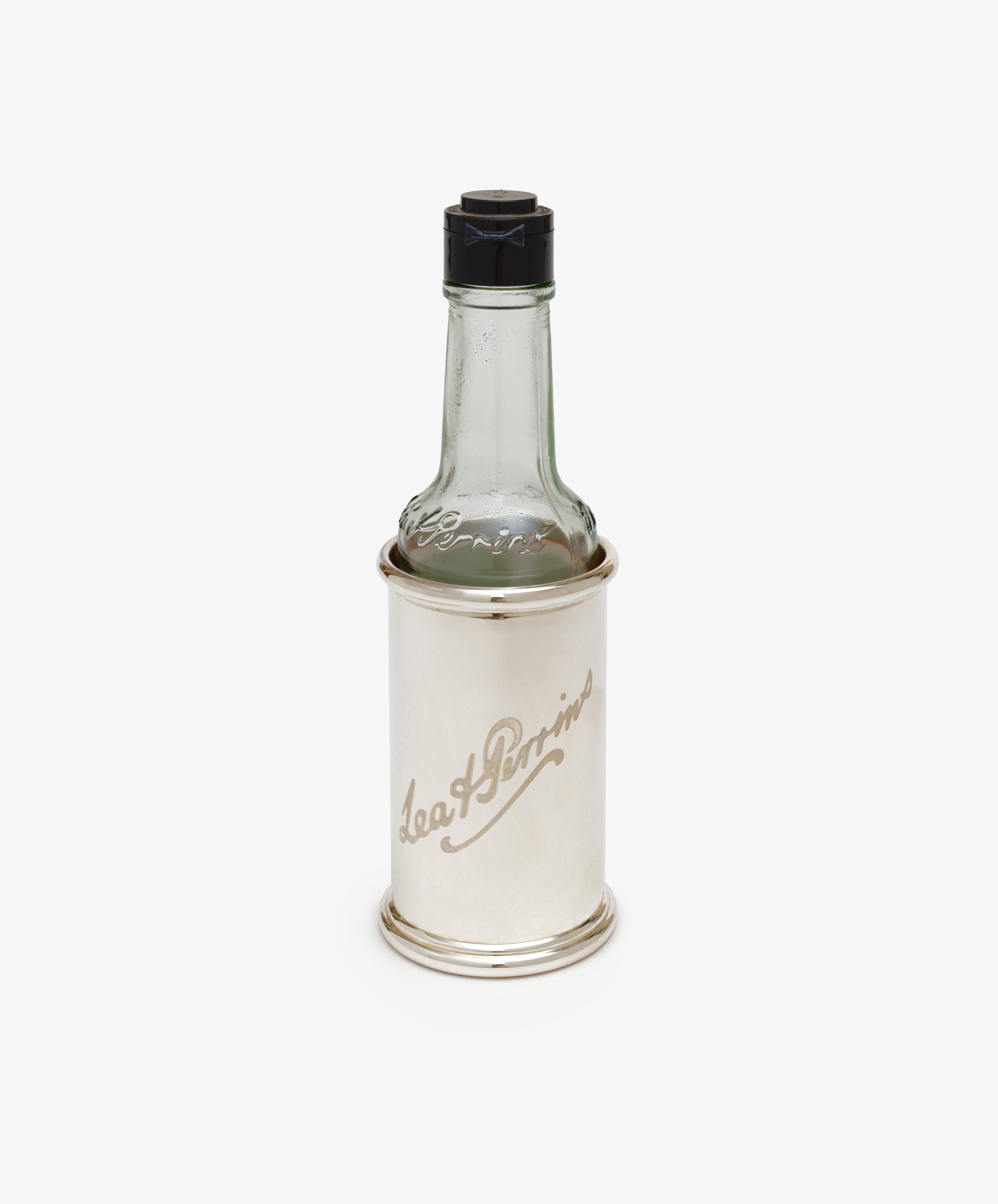 Sterling Silver Lea & Perrin Sleeve. Glass worchestchire bottle with engraved sleeve.