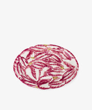 The Radicchio Oval Serving Platter features a vibrant design of red and white radicchio leaves on a white background.