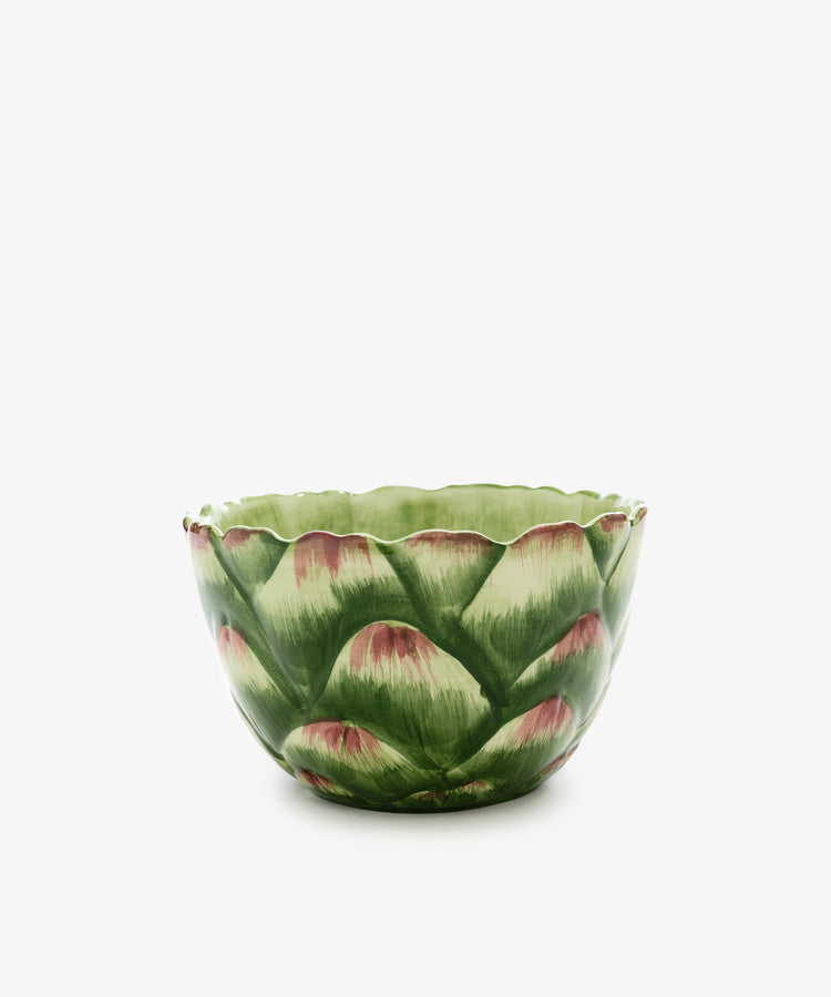 Artichoke bowl. Hand-painted green earthenware bowl that resembles the petals of an artichoke. Side view.
